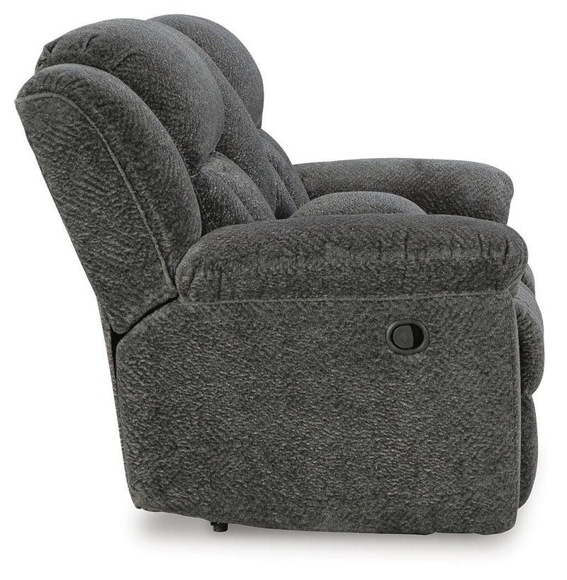 Sofá reclinable Frohn con consola